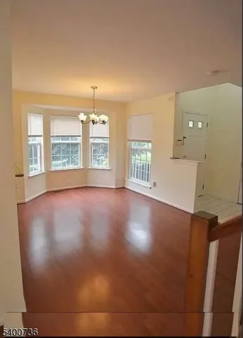 a view of livingroom with hardwood floor and window