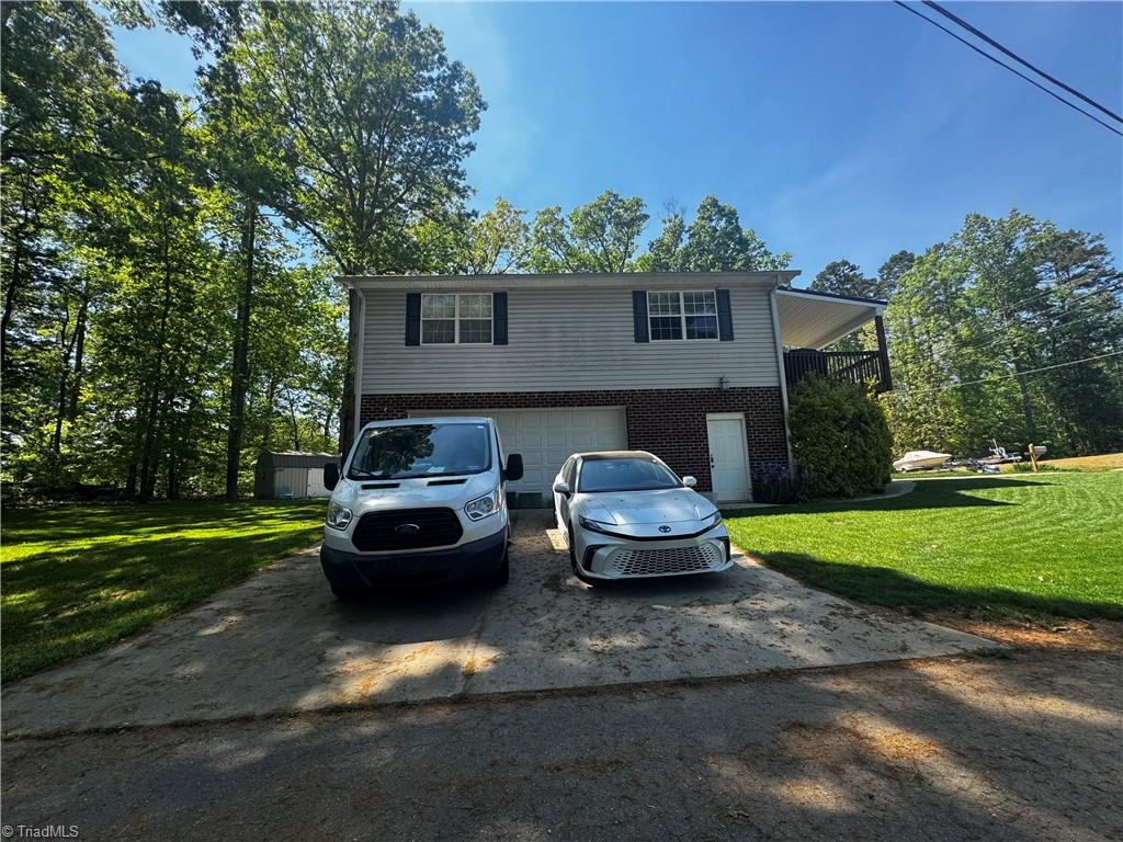 103 Robin Hood Road Lexington, NC 27292 - Photo 3 of 26 Side view with fresh sewn yard