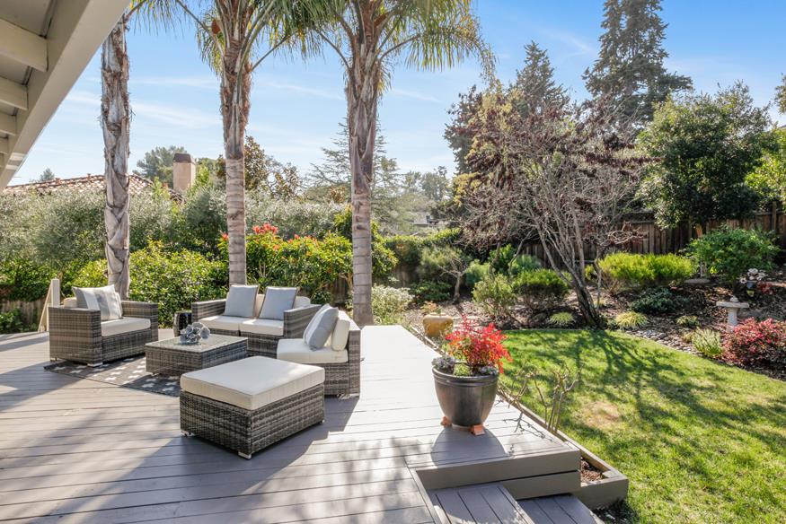 1055 Cascade Drive Menlo Park, CA 94025 - Photo 21 of 24 a view of a patio with couches table and chairs and potted plants