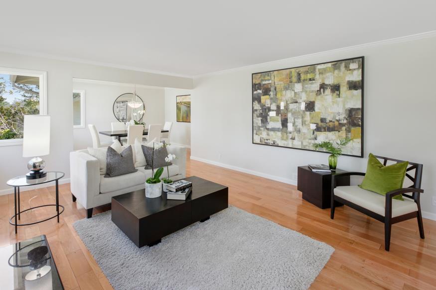 1055 Cascade Drive Menlo Park, CA 94025 - Photo 4 of 24 a living room with furniture potted plant and a window