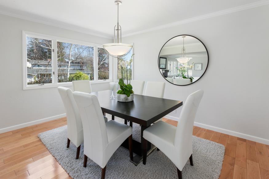 1055 Cascade Drive Menlo Park, CA 94025 - Photo 5 of 24 a view of a dining room with a table and chairs