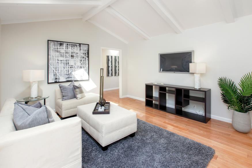 1055 Cascade Drive Menlo Park, CA 94025 - Photo 8 of 24 a living room with furniture and a fireplace