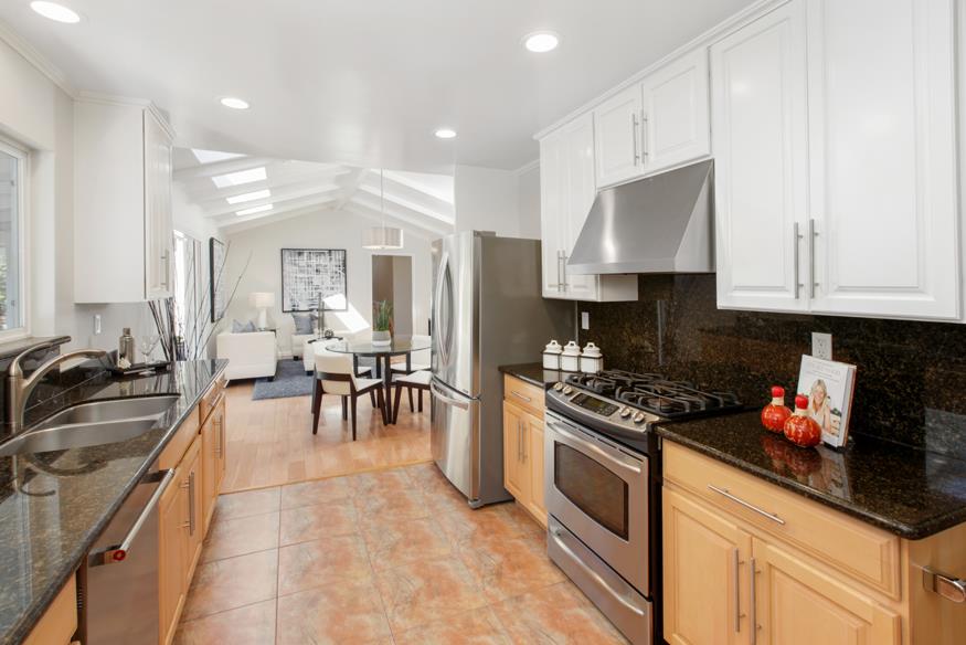 1055 Cascade Drive Menlo Park, CA 94025 - Photo 10 of 24 a kitchen with a stove a sink and cabinets