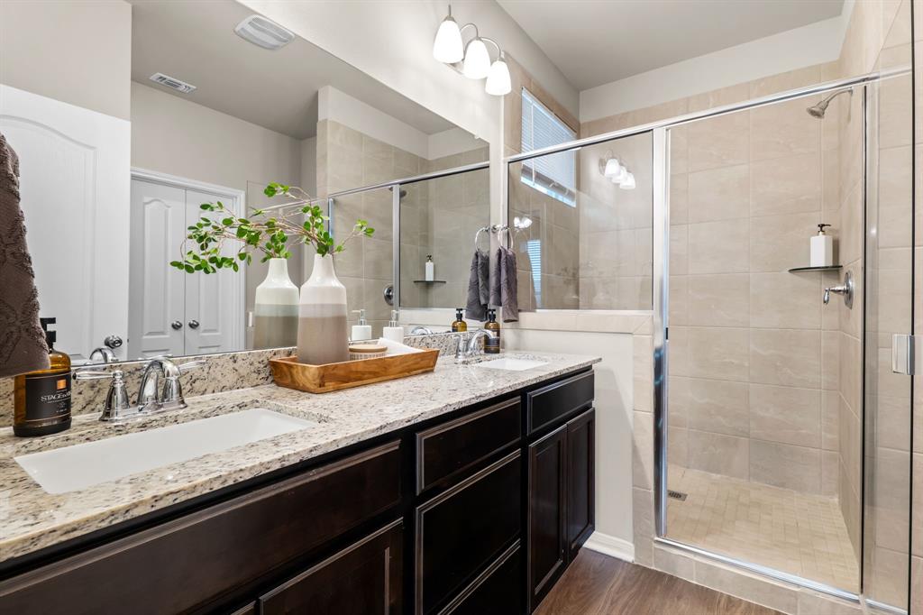 11233 Solar Street Lorena, TX 76655 - Photo 15 of 33 primary ensuite bathroom with dual sinks