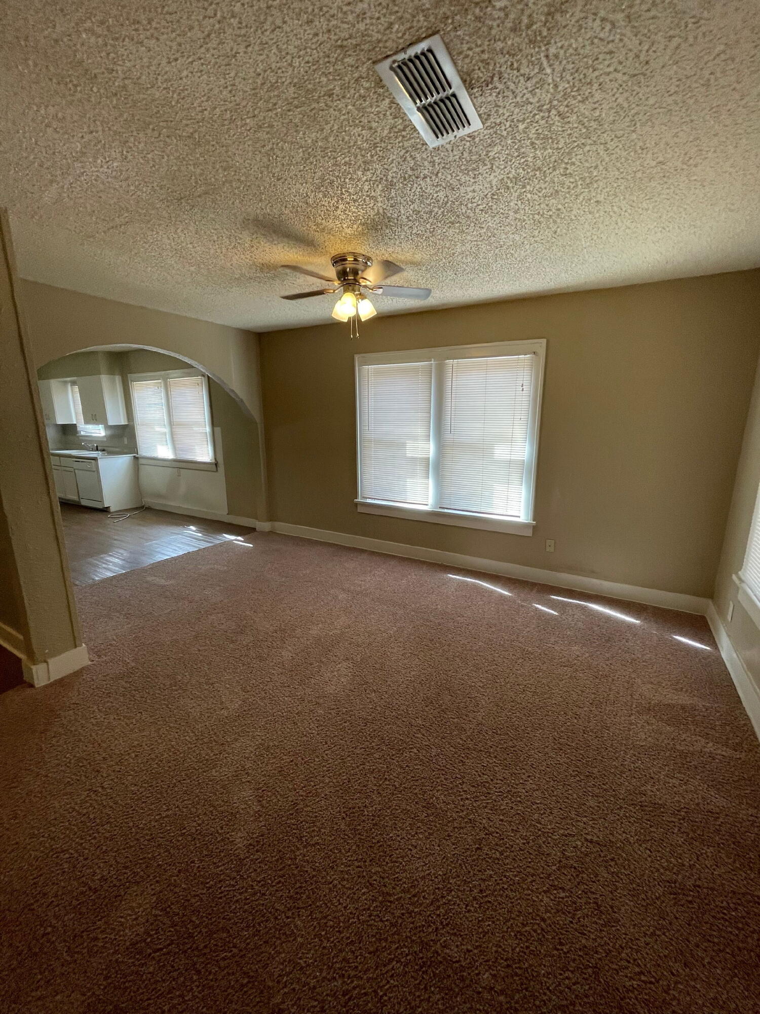 2111 14th Street Lubbock, TX 79401 - Photo 2 of 10 a view of a livingroom and a fireplace