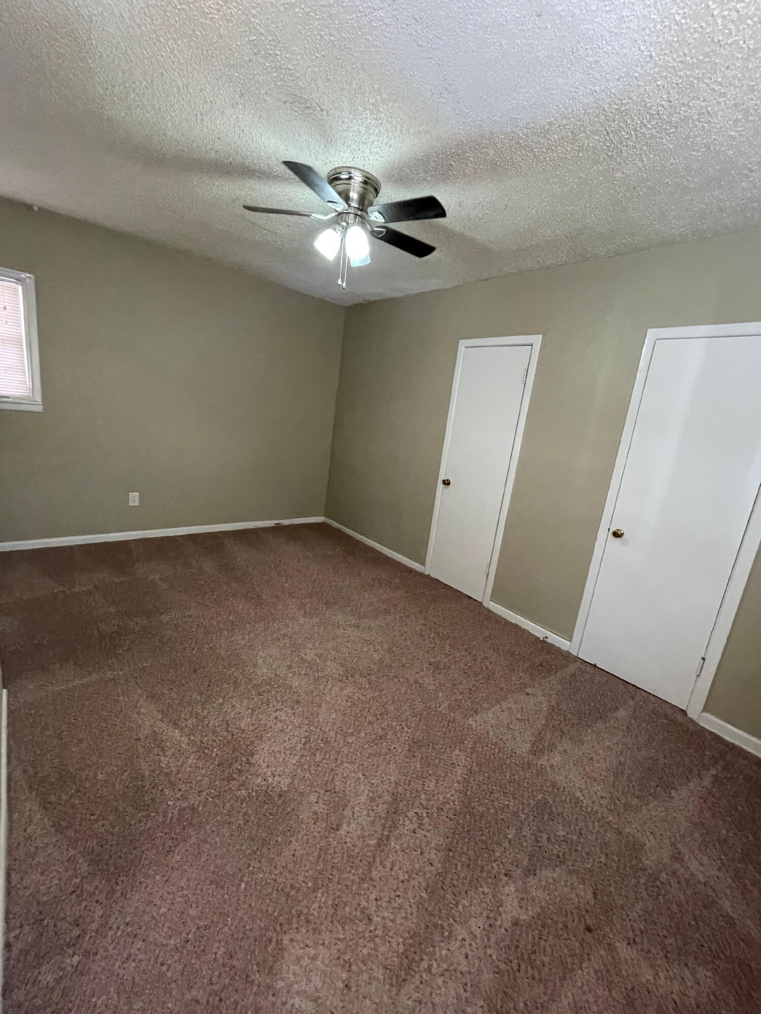 2111 14th Street Lubbock, TX 79401 - Photo 9 of 10 a view of an empty room
