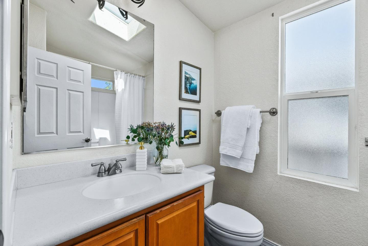 100 North Rodeo Gulch Road, Unit 74 Soquel, CA 95073 - Photo 17 of 40 a bathroom with a sink a toilet and shower