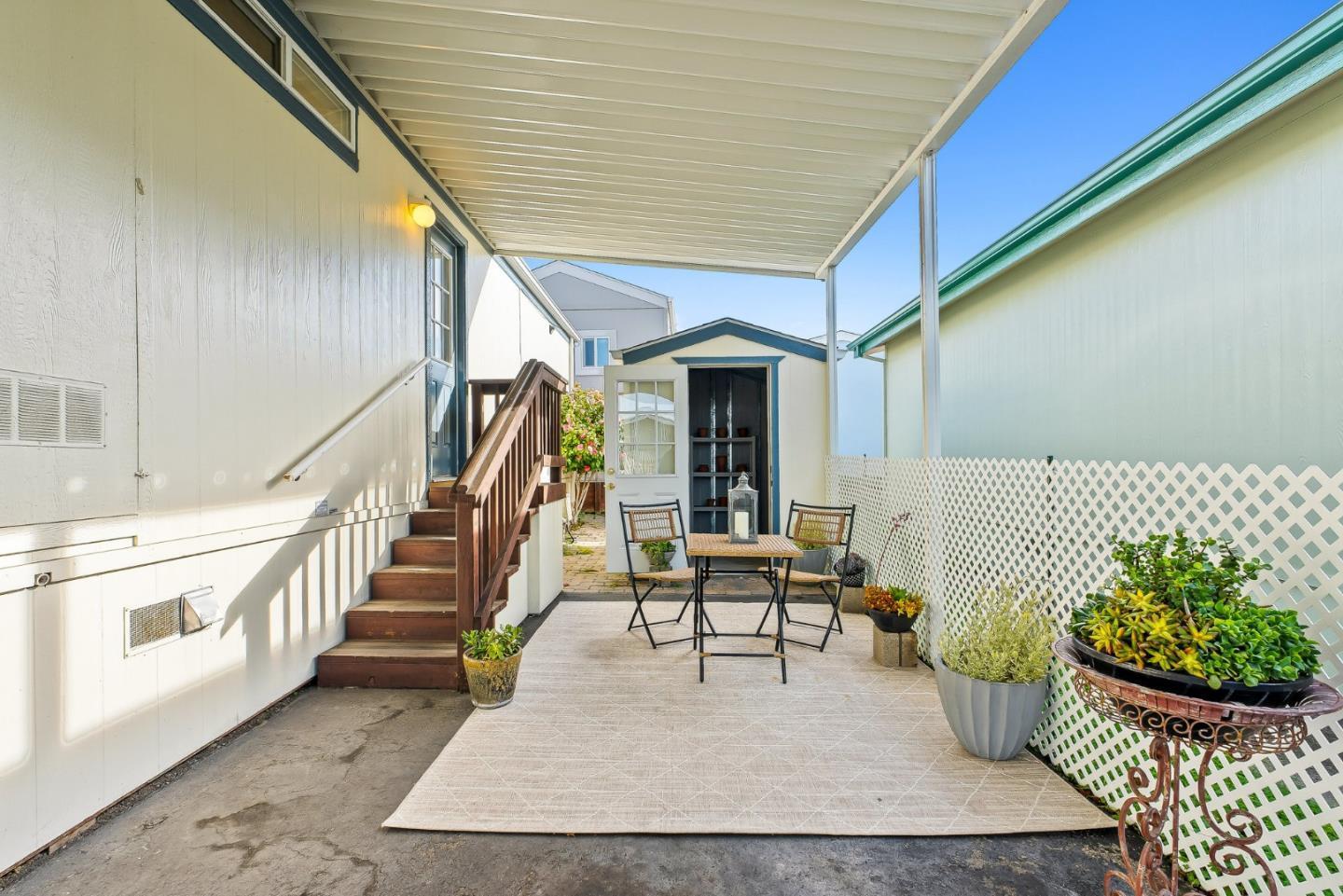 100 North Rodeo Gulch Road, Unit 74 Soquel, CA 95073 - Photo 5 of 40 a living room with furniture and a rug