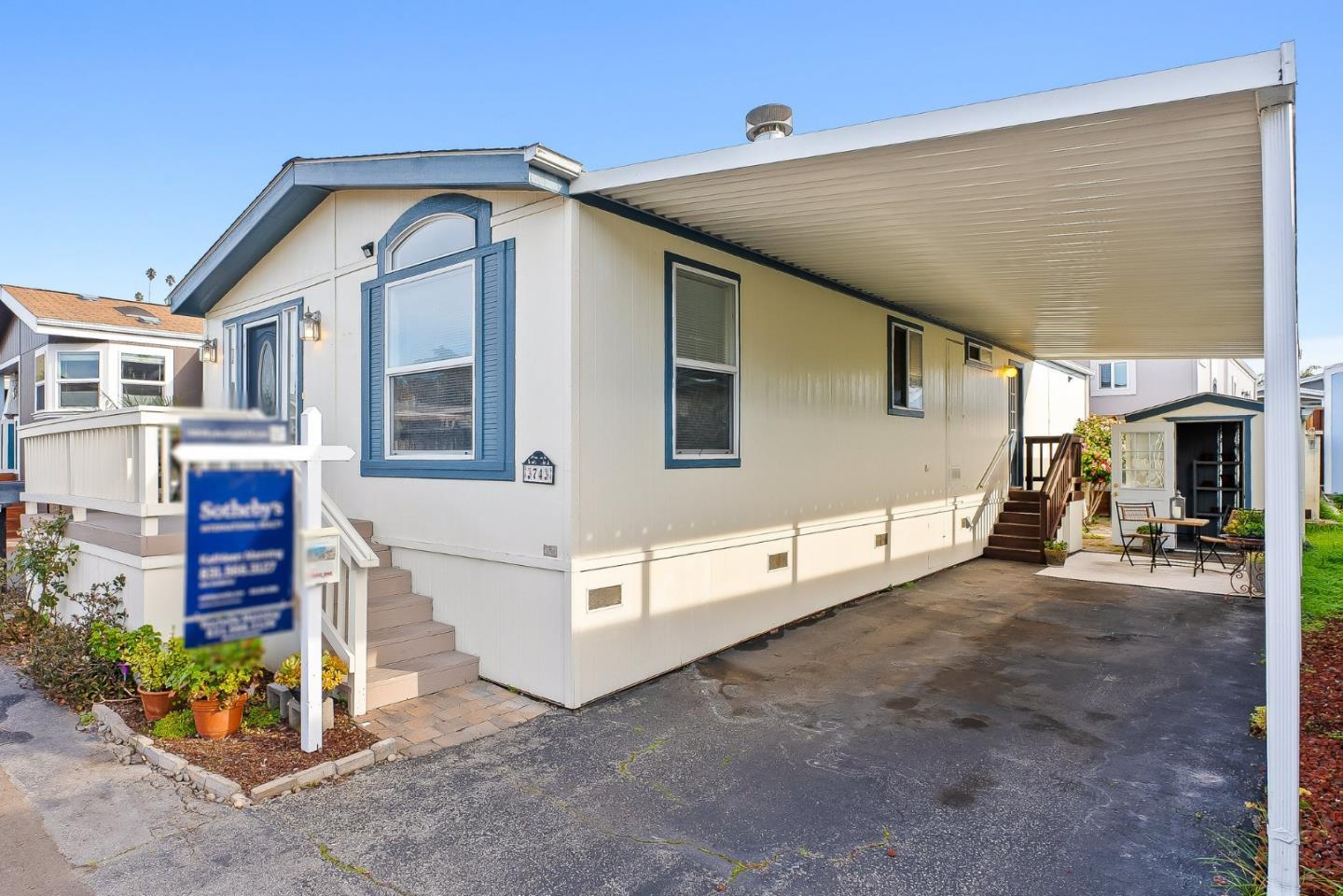 100 North Rodeo Gulch Road, Unit 74 Soquel, CA 95073 - Photo 6 of 40 a front view of a house with a yard