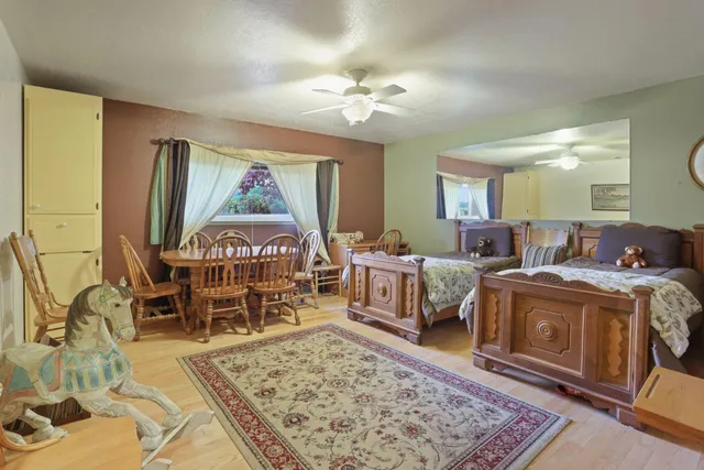 a front view of a house with a garden and porch