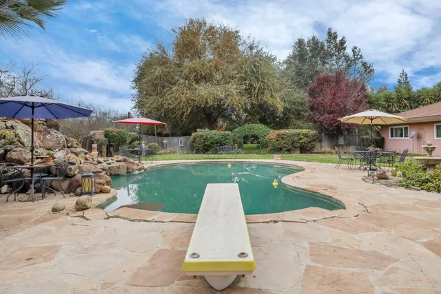 a view of a balcony with an ocean view