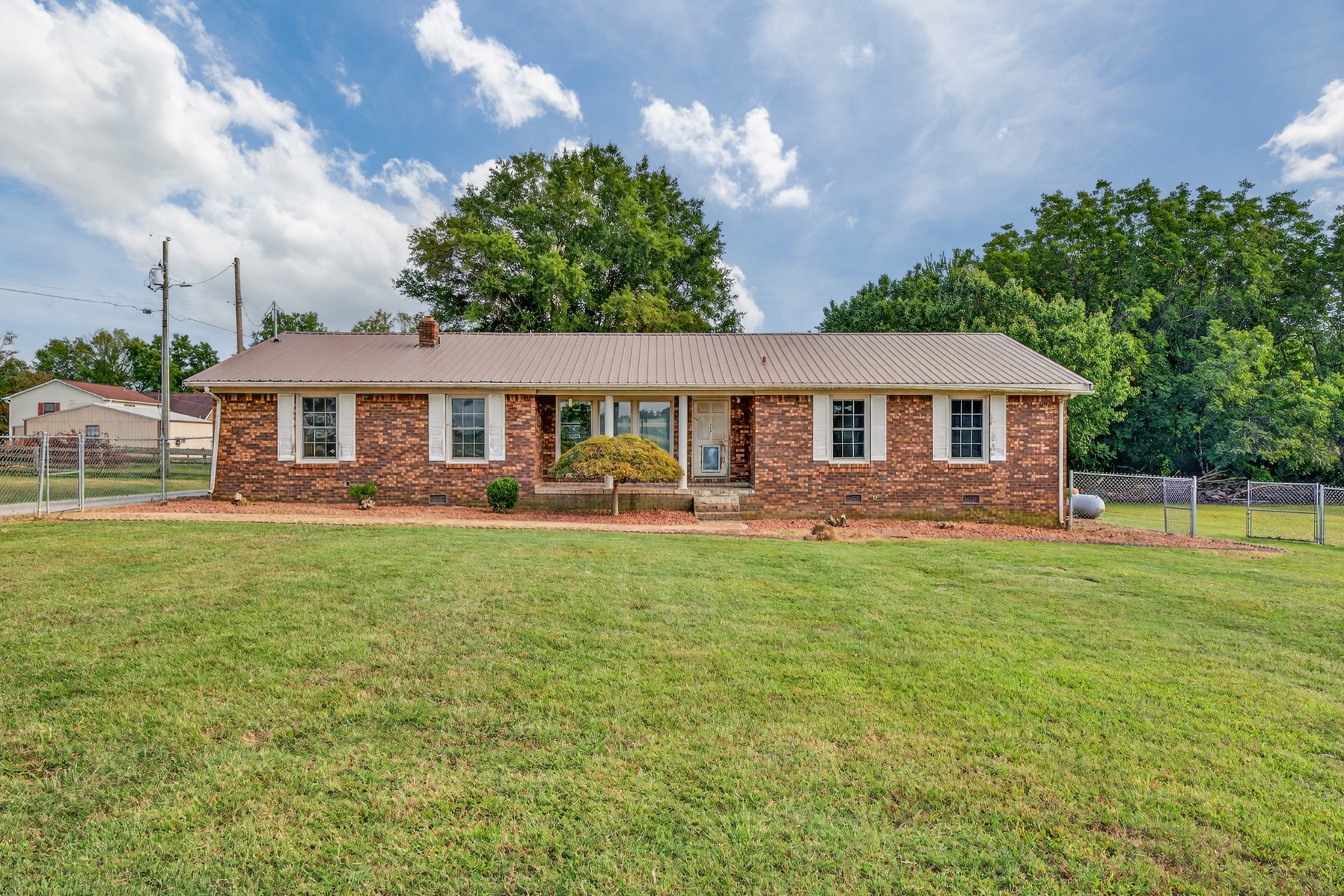 509 Limestone Road Elora, TN 37328 - Photo 1 of 41 a front view of a house with swimming pool