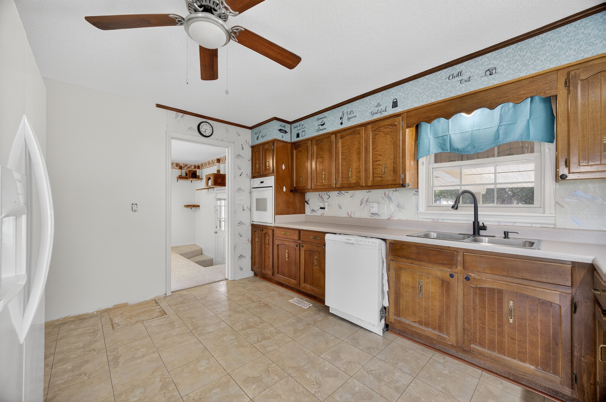 509 Limestone Road Elora, TN 37328 - Photo 13 of 41 a kitchen with sink cabinets and window