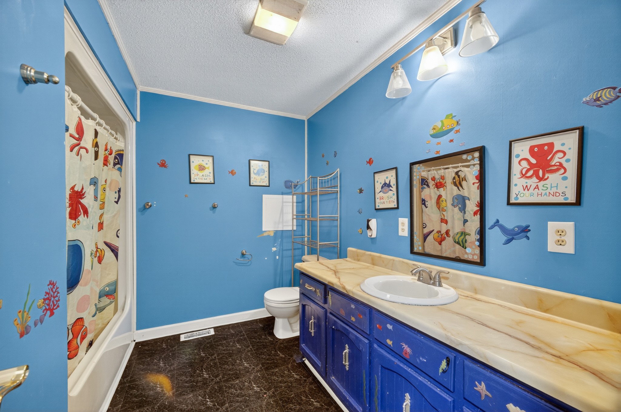 509 Limestone Road Elora, TN 37328 - Photo 24 of 41 a bathroom with a sink a mirror and a toilet