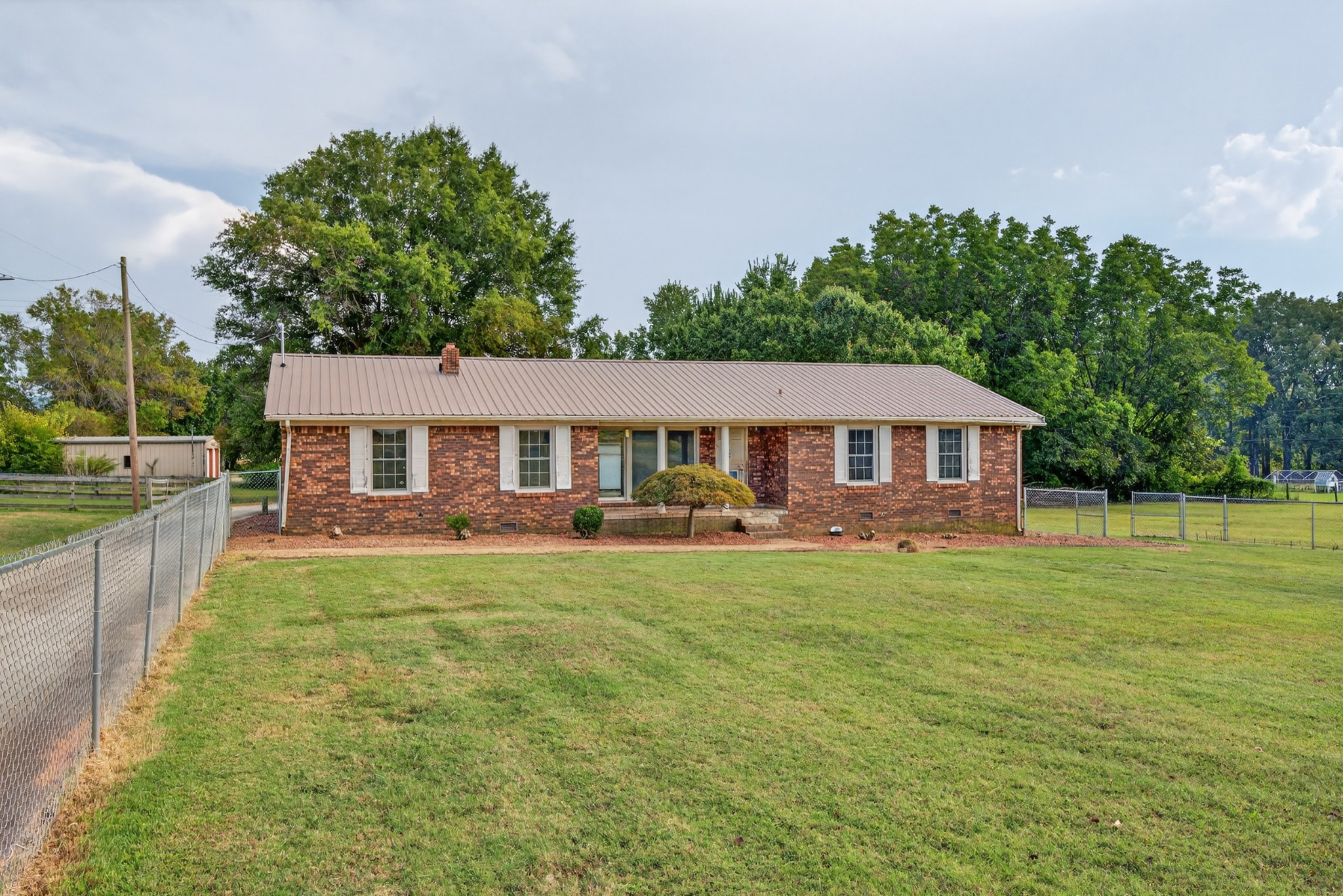 509 Limestone Road Elora, TN 37328 - Photo 30 of 41 a front view of a house with a garden