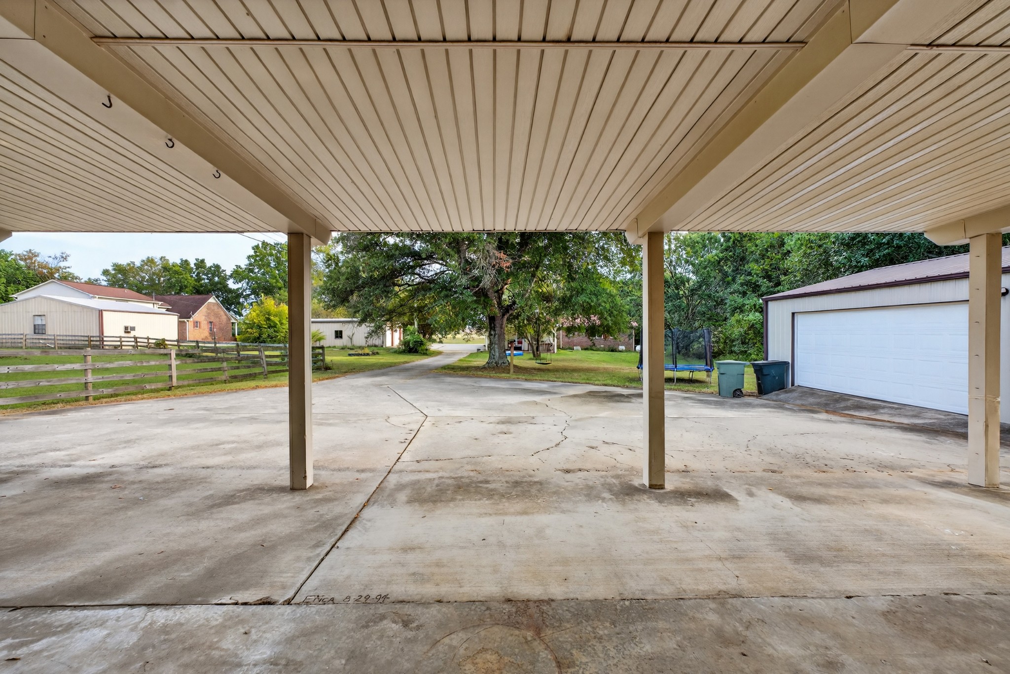 509 Limestone Road Elora, TN 37328 - Photo 40 of 41 a view of a house with backyard and a garage