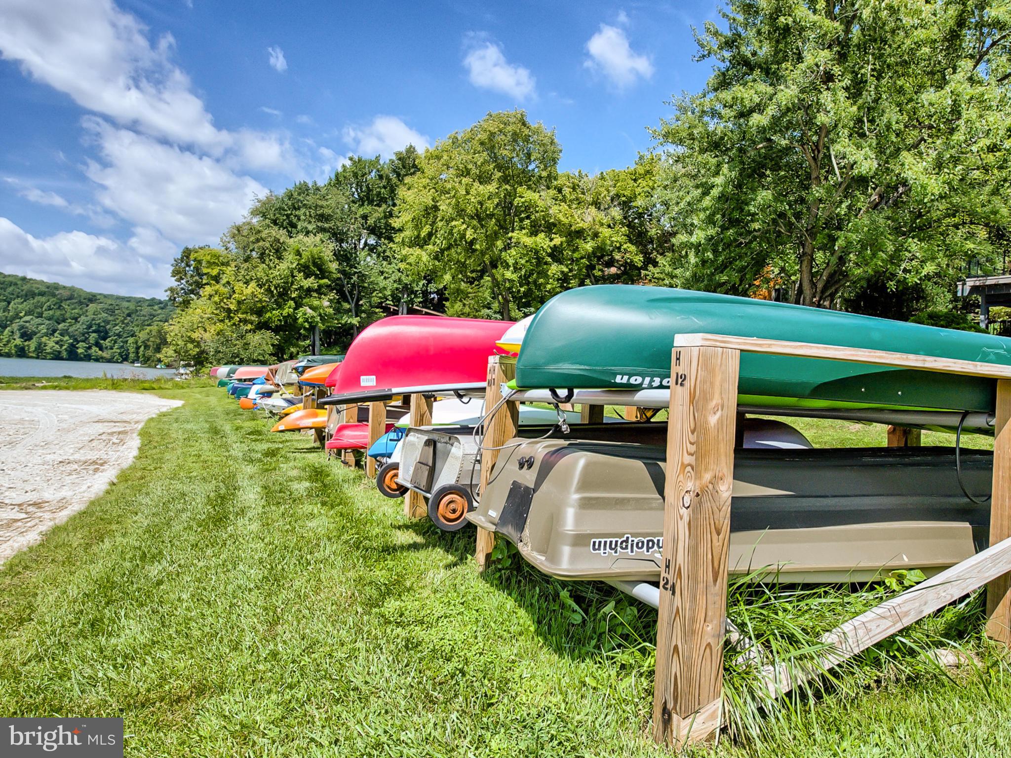 6764 West Lakeridge Road New Market, MD 21774 - Photo 4 of 6 a view of a wooden deck and a yard