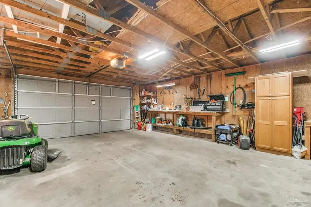 a view of a garage with storage