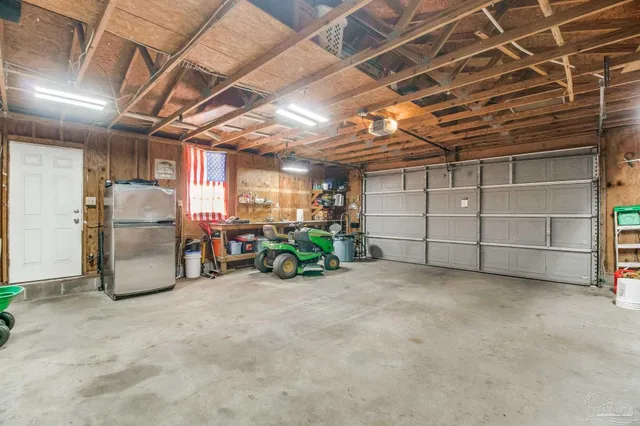 a view of a garage with furniture