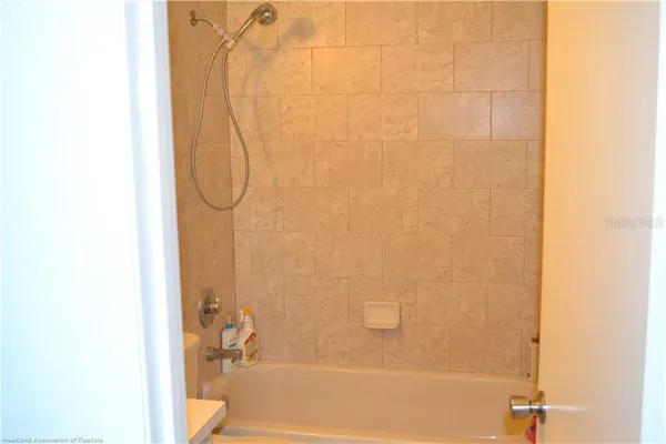 a bathroom with a bath tub