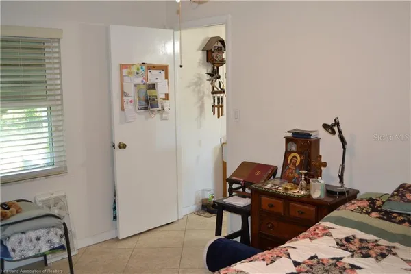 a room with furniture and wooden floor