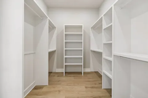 a view of an empty walk in closet