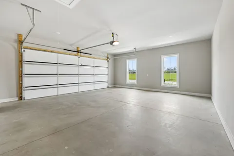 a view of a room with window and natural light