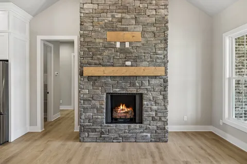 a living room with a fireplace