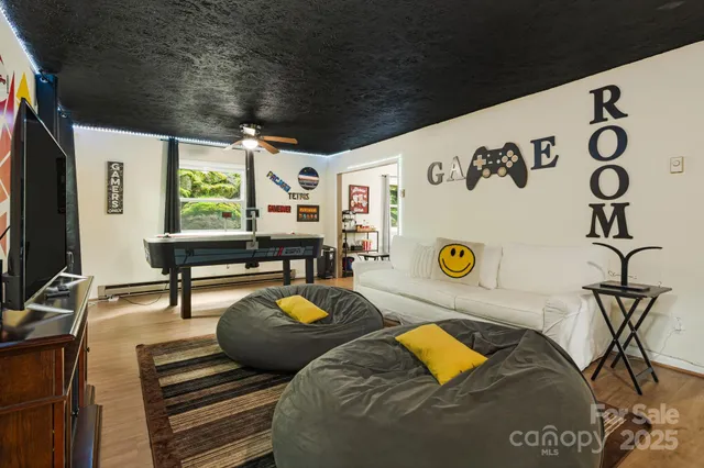 a bedroom with furniture and a window