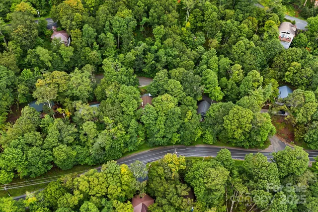 a view of a garden with a building