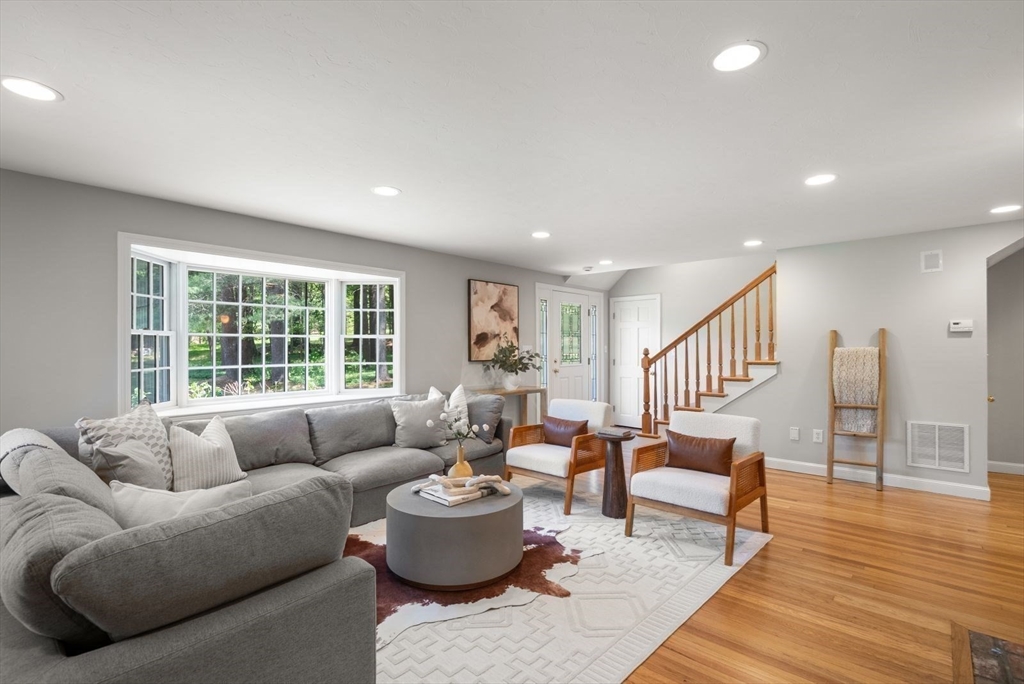 49 Walpole Street Dover, MA 02030 - Photo 15 of 40 a living room with furniture and a table