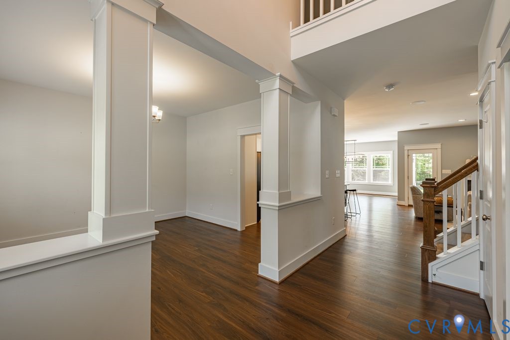 9377 Magnolia Blossom Road Ashland, VA 23005 - Photo 26 of 49 a view of a hallway view with wooden floor and staircase