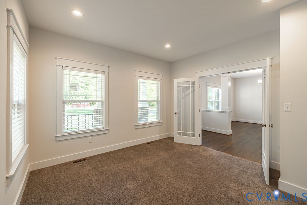 9377 Magnolia Blossom Road Ashland, VA 23005 - Photo 27 of 49 an empty room with windows and closet