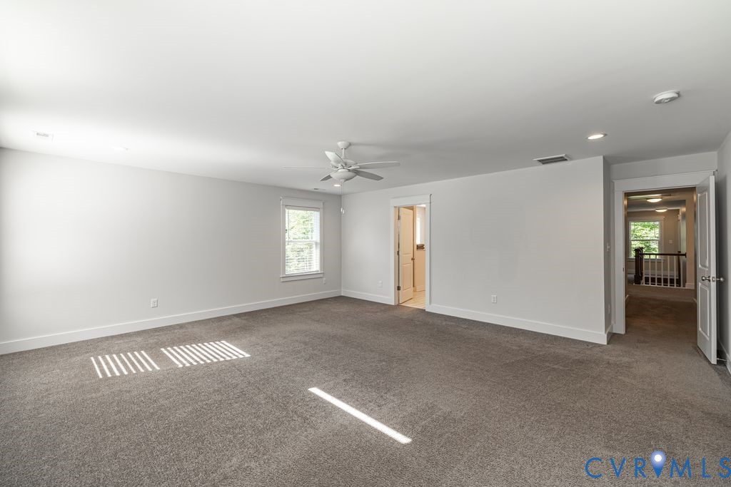 9377 Magnolia Blossom Road Ashland, VA 23005 - Photo 29 of 49 an empty room with windows and closet
