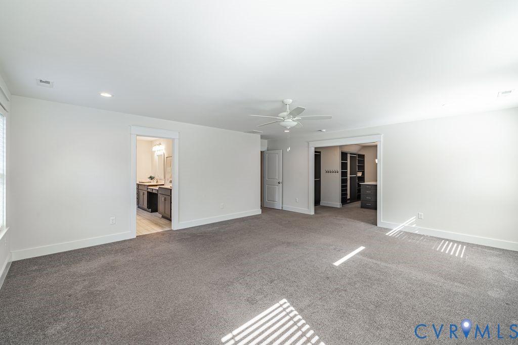 9377 Magnolia Blossom Road Ashland, VA 23005 - Photo 31 of 49 a view of empty room with kitchen