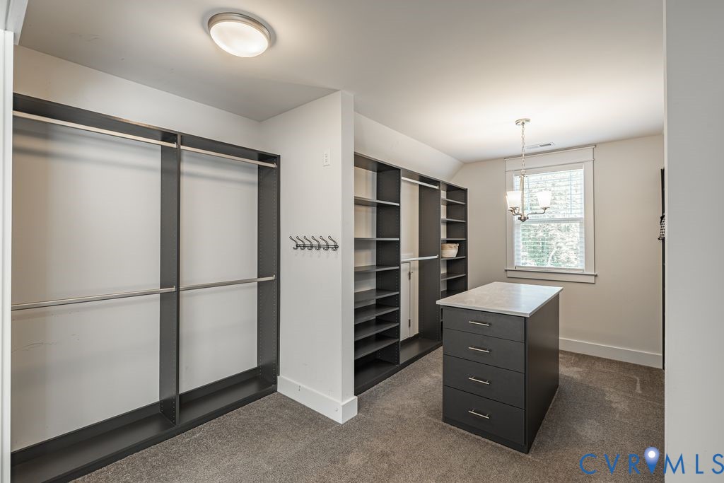 9377 Magnolia Blossom Road Ashland, VA 23005 - Photo 32 of 49 a view of walk in closet with window