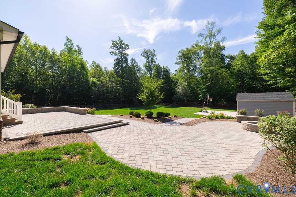 9377 Magnolia Blossom Road Ashland, VA 23005 - Photo 6 of 49 a view of a backyard