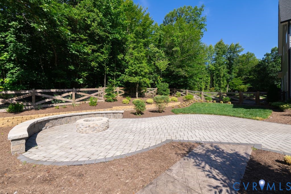 9377 Magnolia Blossom Road Ashland, VA 23005 - Photo 9 of 49 a view of a swimming pool with a slide