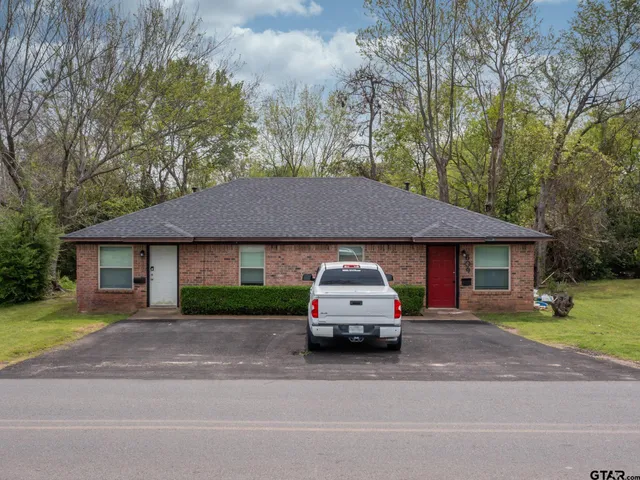 a car parked in front of a house