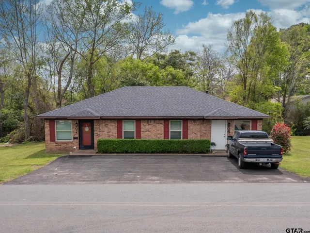 a car parked in front of a house