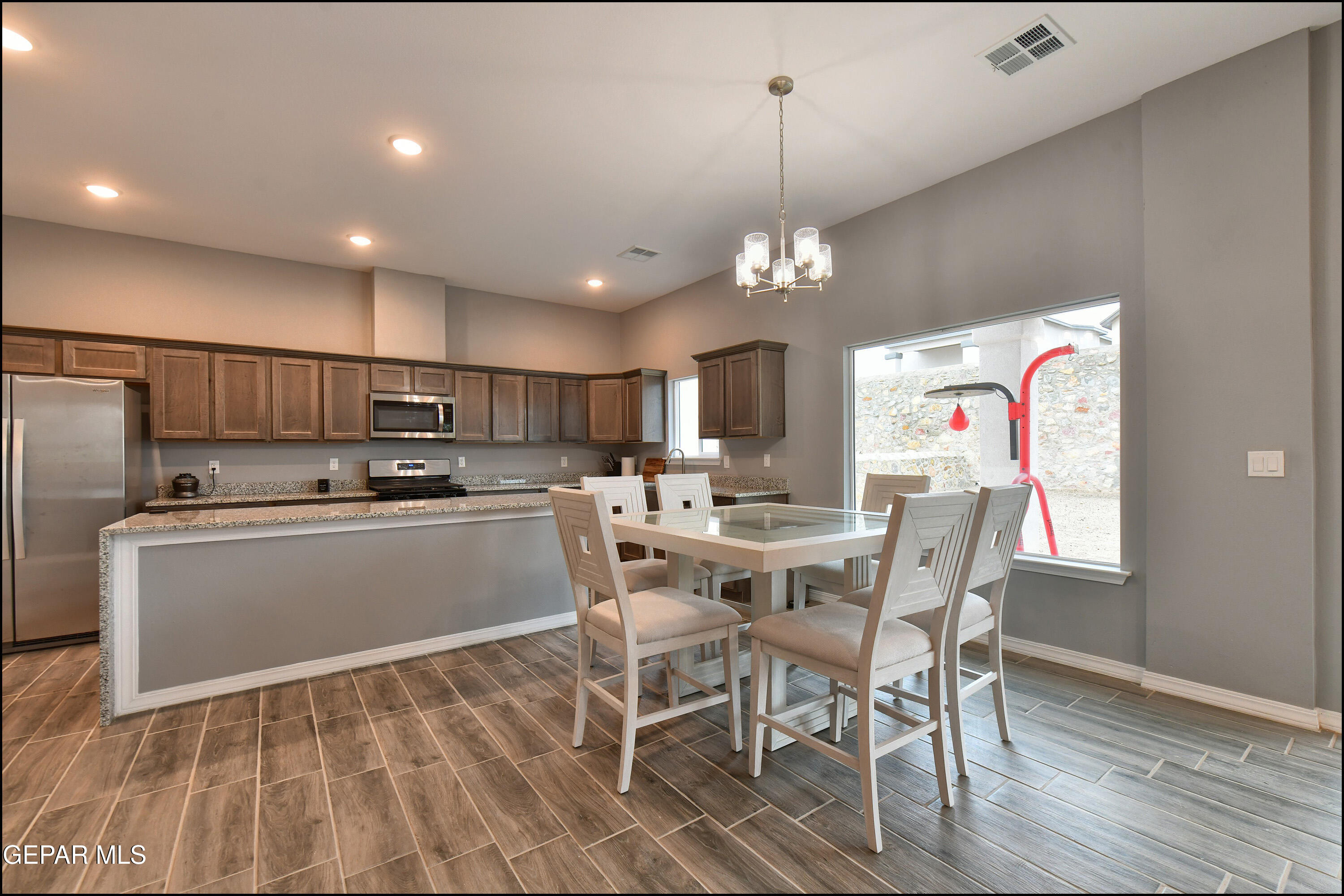 8408 Phil Place Vinton, TX 79821 - Photo 10 of 43 Eating area to kitchen