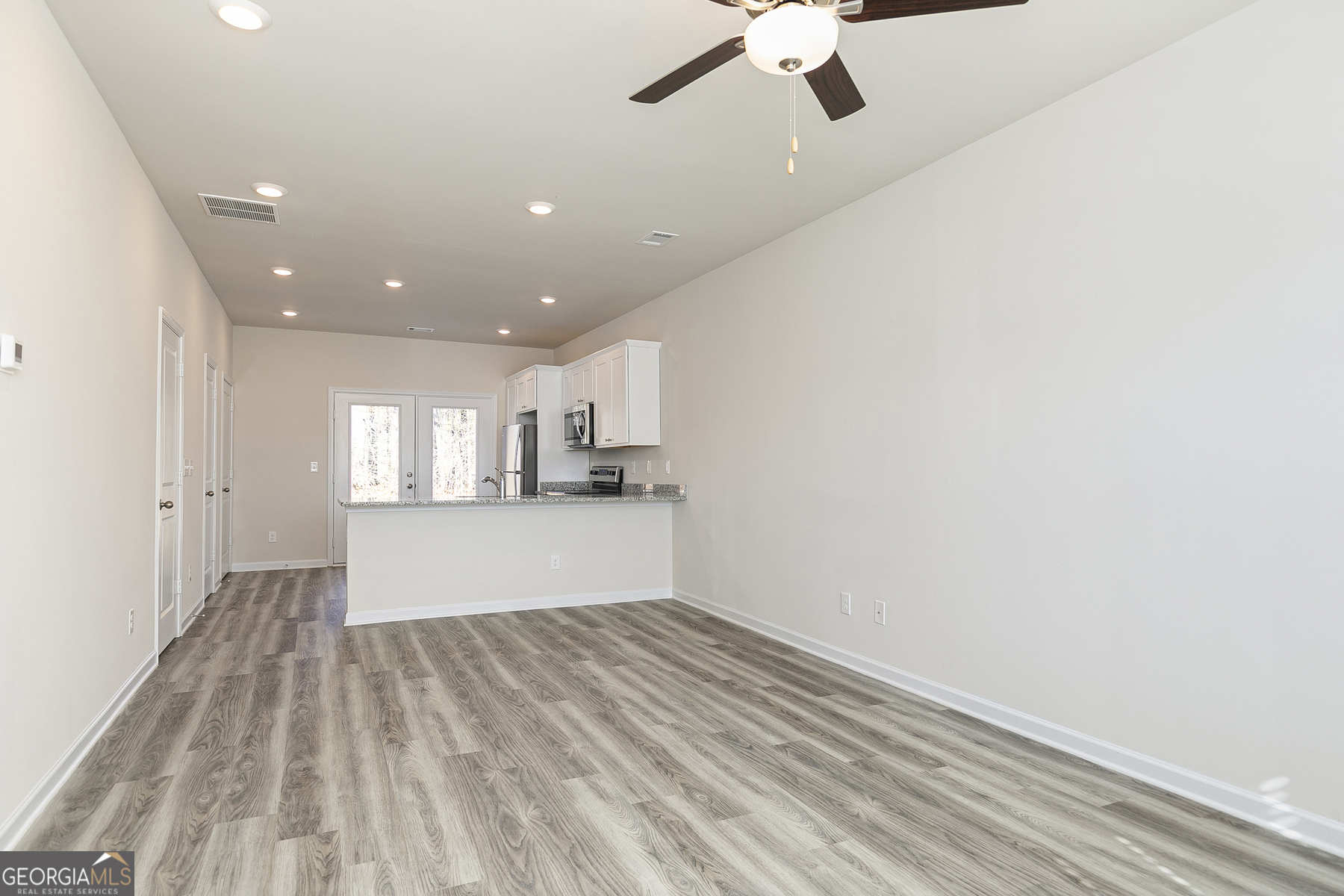 241 Rooker Drive LaGrange, GA 30241 - Photo 8 of 15 a view of empty room with wooden floor