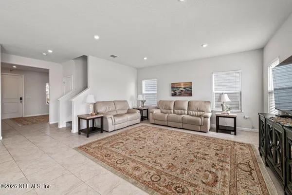 a living room with furniture and a couch