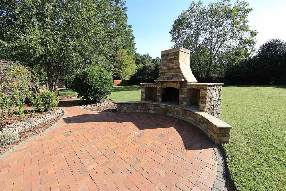 1721 Bayleaf Trail Raleigh, NC 27614 - Photo 2 of 30 Lovely stone fireplace to enjoy on cool evenings! Outdoor fireplace
