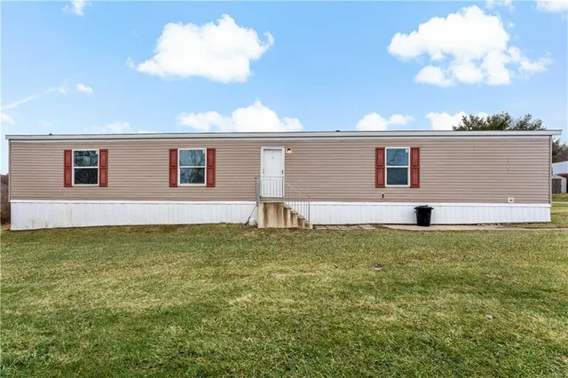 a house view with a garden space