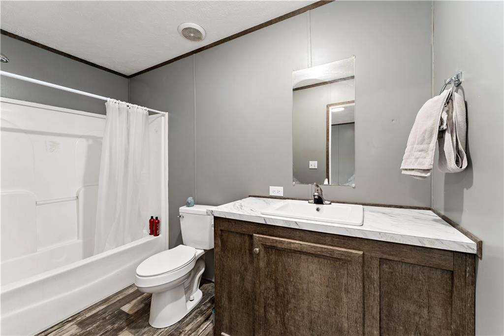 48 Brookhaven Avenue Washington, PA 15301 - Photo 14 of 35 a bathroom with a sink vanity mirror and toilet