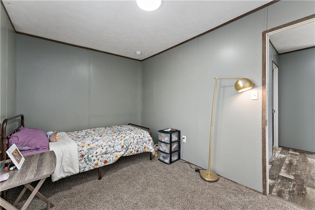 48 Brookhaven Avenue Washington, PA 15301 - Photo 16 of 35 a bedroom with a bed and a table