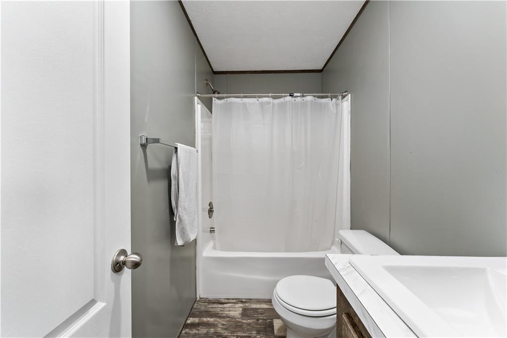 48 Brookhaven Avenue Washington, PA 15301 - Photo 22 of 35 a white toilet sitting next to a bath tub