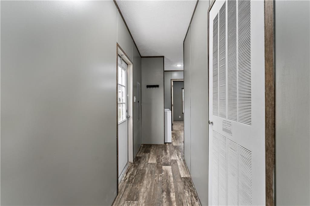 48 Brookhaven Avenue Washington, PA 15301 - Photo 23 of 35 a view of a hallway with wooden floor and staircase