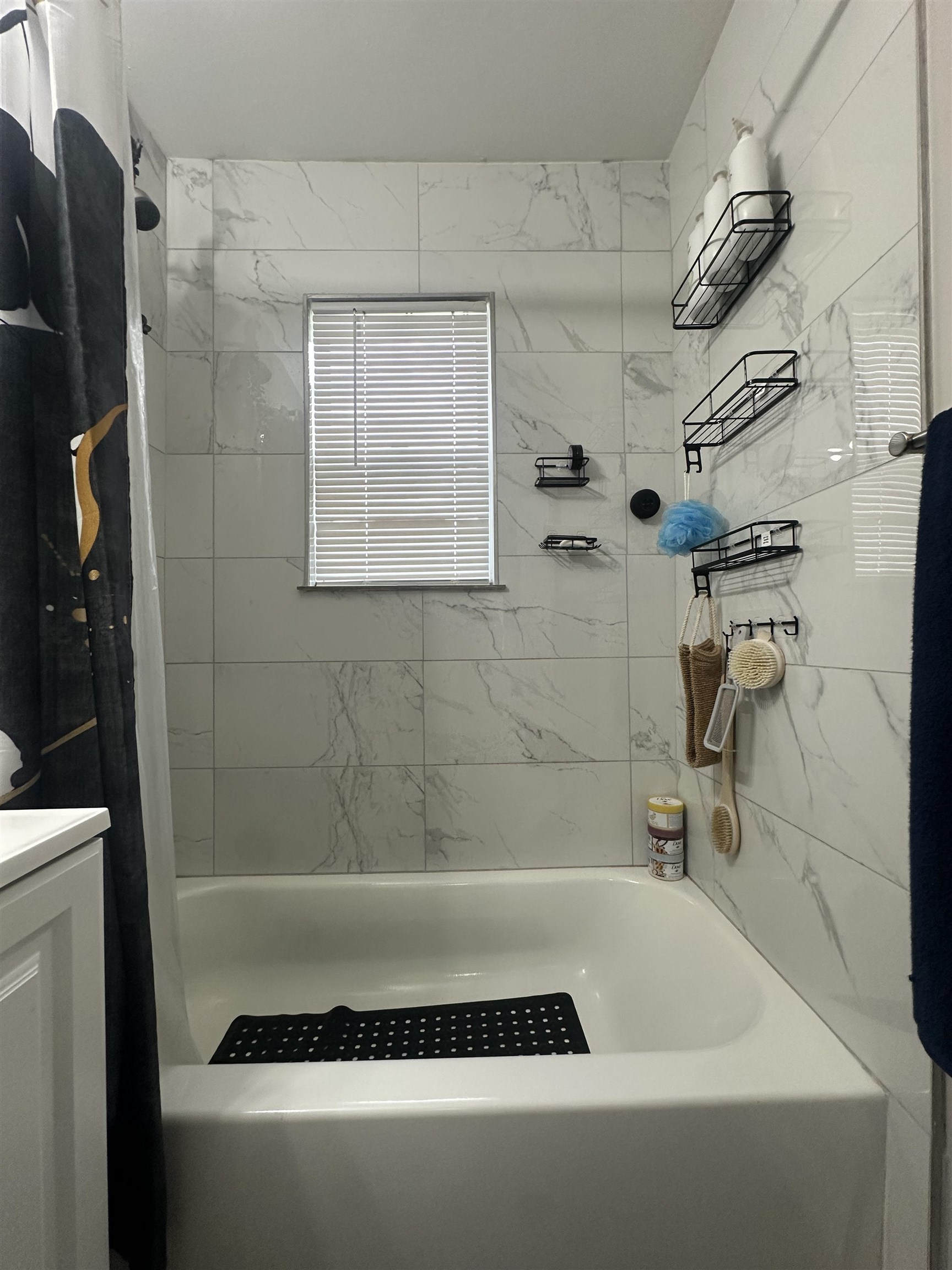 3534 Rochester Road Memphis, TN 38109 - Photo 10 of 13 Full bath with shower / bathtub combination with curtain and vanity